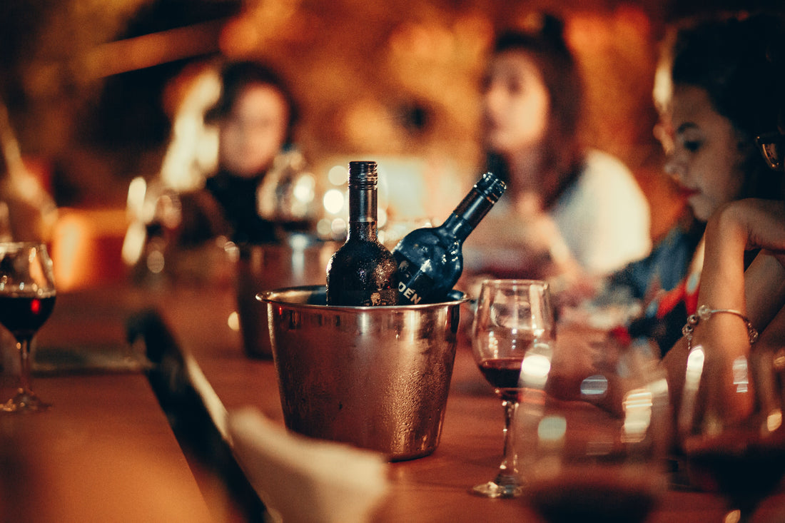 How to Open a Wine Bottle Without a Corkscrew (And How to Recork It)