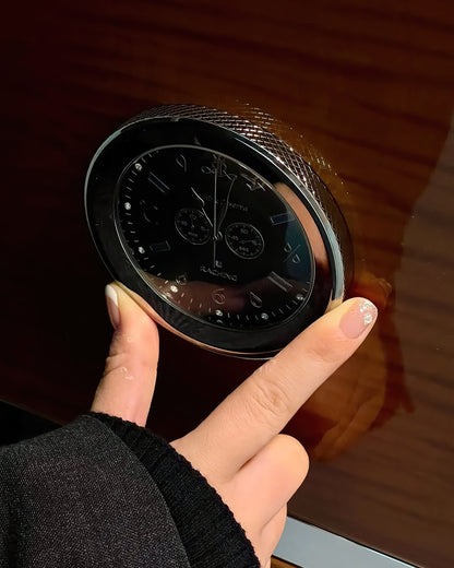 Detail shot of the RR980 signature Swiss-style analog watch dial and polished stainless steel accents on the door frame.