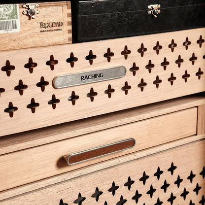 Interior view of the Raching Reserva RR980 with Spanish cedar drawers neatly aligned and LED light strips illuminating the cabinet.