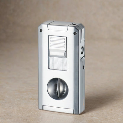 Silver cigar torch lighter and V cutter on a neutral background. 