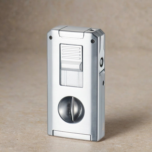 Silver cigar torch lighter and V cutter on a neutral background. 