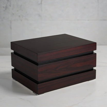 Rosewood desktop humidor box on a light gray background