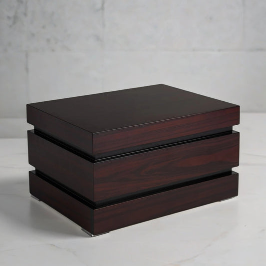 Rosewood desktop humidor box on a light gray background