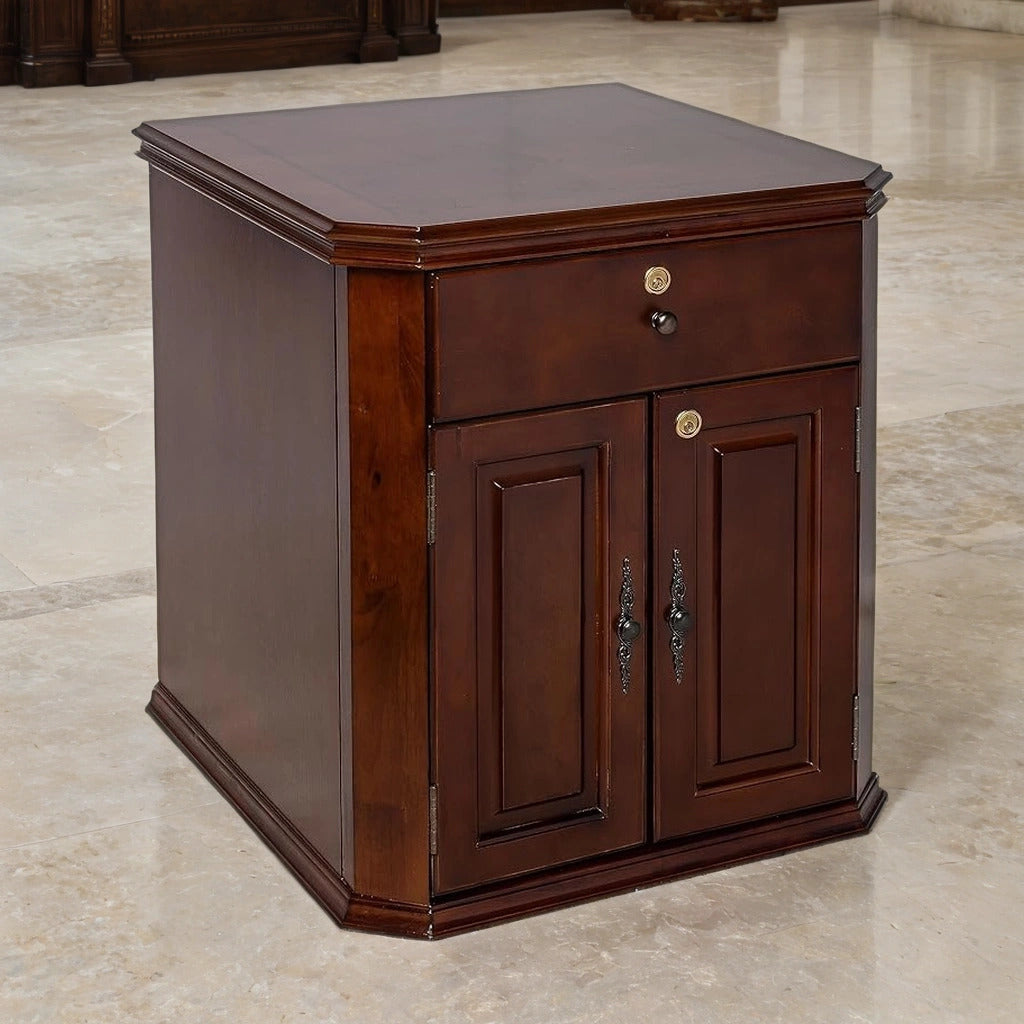 Wooden end table humidor with two doors and a drawer on a marble floor.