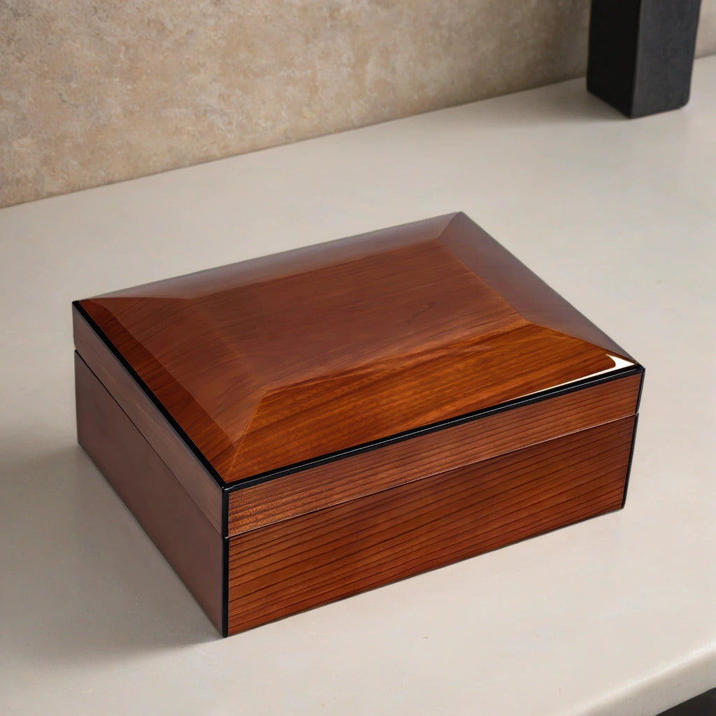 Desktop humidor with a walnut burl finish.