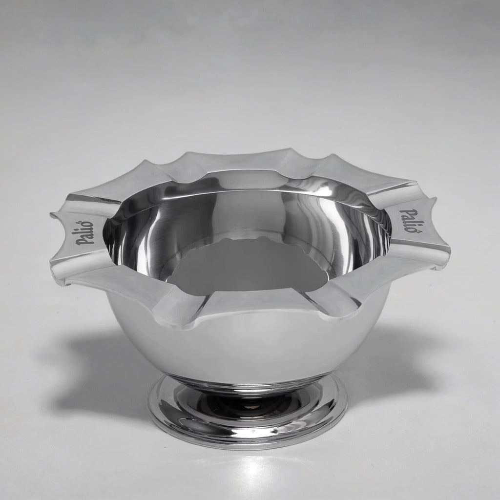 Stainless steel cigar ashtray by Palio in a plain white photo studio.