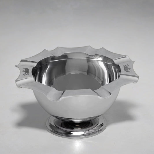 Stainless steel cigar ashtray by Palio in a plain white photo studio.