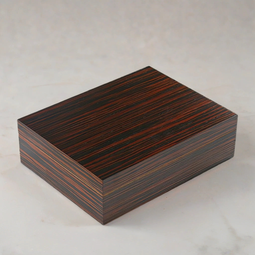 Small desktop humidor with an ebony wood finish