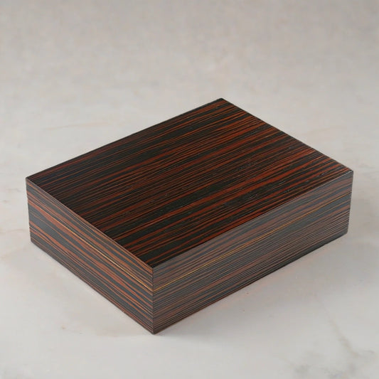 Small desktop humidor with an ebony wood finish